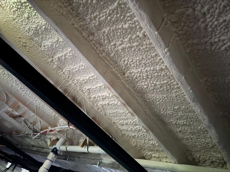Closed-cell spray foam applied to roof deck