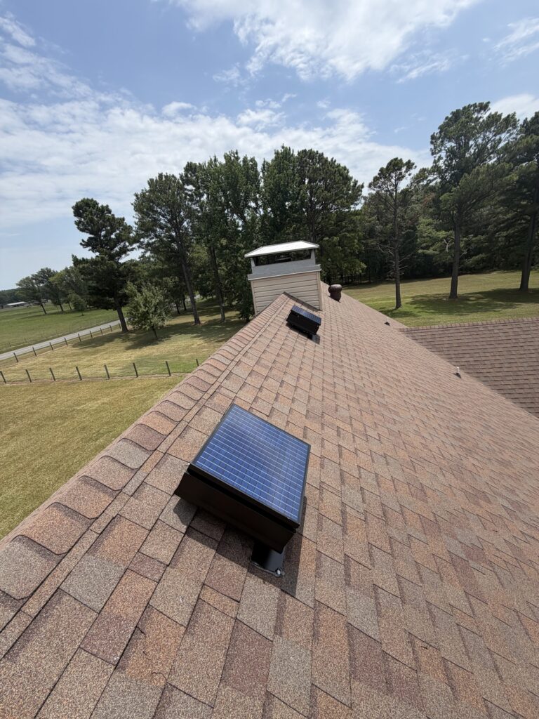 Solar attic fan on a shingle roof