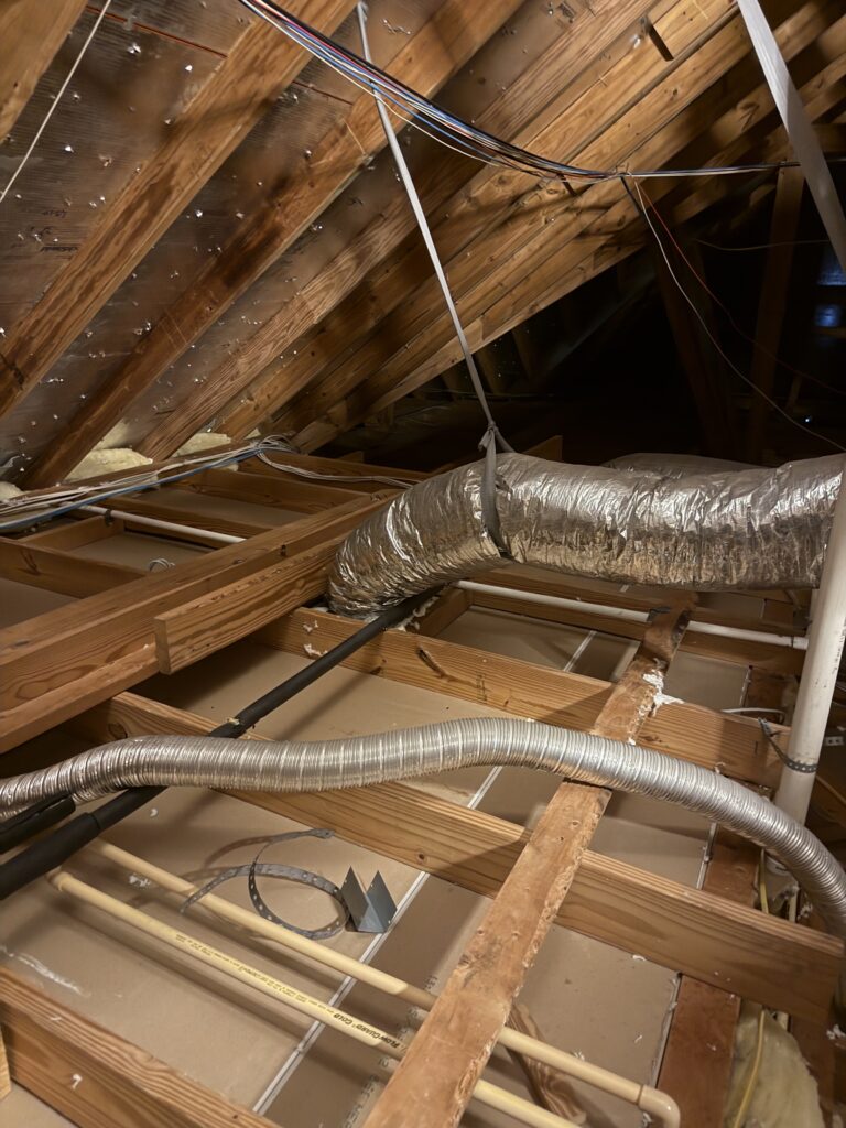 Attic cleanout around ducts and plumbing